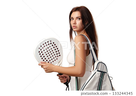 Young woman ready for paddle tennis match holding a racket and sports bag Young woman ready for paddle tennis match holding a racket and sports bag 133244345