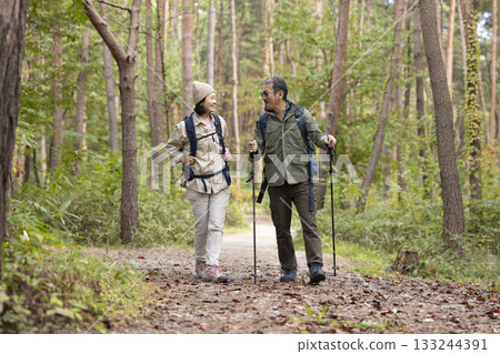A middle-aged couple hiking 133244391