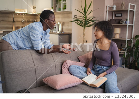 Mother Scolding Teenage Daughter at Home Mother Scolding Teenage Daughter at Home 133245305