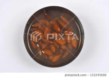 Almonds soaking in water Almonds soaking in water 133245690