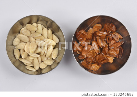 Peeling almonds Peeling almonds 133245692