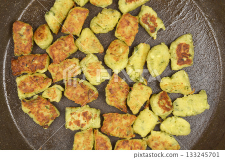 Fried zucchini gnocchi Fried zucchini gnocchi 133245701