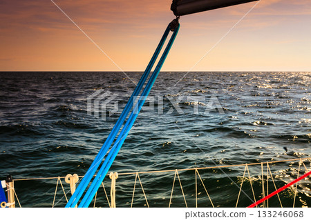 Yachting on sail boat during sunny weather 133246068