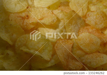 Crispy potato chips elegantly arranged for a delightful snack time experience 133246262