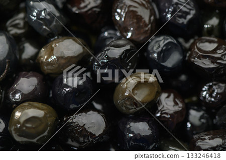 Glimmering berries showcasing texture and color in a bountiful harvest during twilight hours Glimmering berries showcasing texture and color in a bountiful harvest during twilight hours 133246418