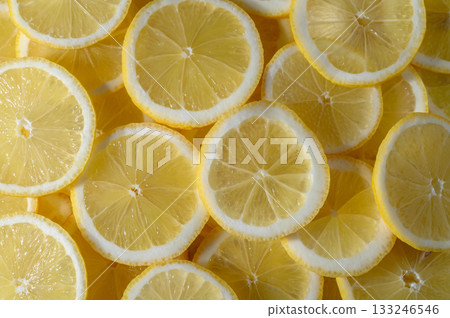 Bright and vibrant lemon slices arranged in a delightful display for culinary inspiration 133246546