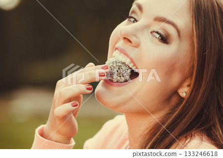 Woman with liitle cookie cupcake. Woman with liitle cookie cupcake. 133246618