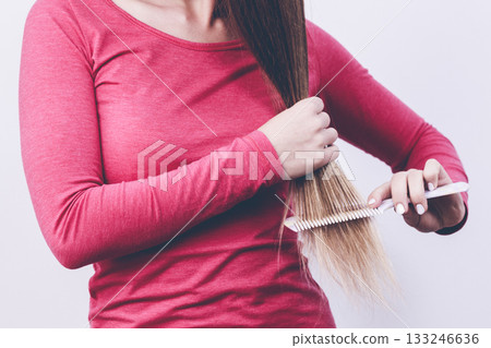 Woman brush long hair. 133246636
