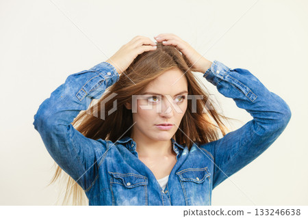 Fashionable woman with blowing hair 133246638