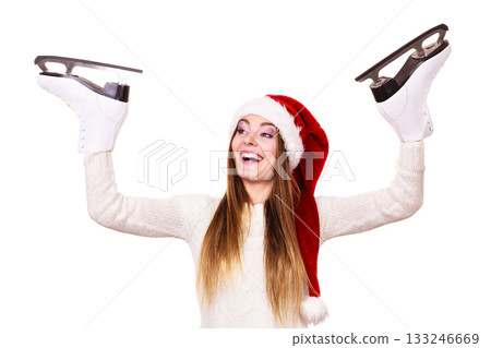 woman santa claus with ice skates woman santa claus with ice skates 133246669