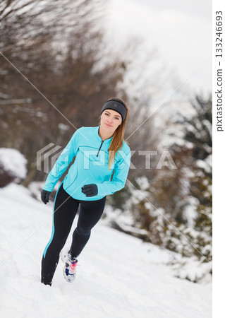 Winter sport, girl exercising in park Winter sport, girl exercising in park 133246693