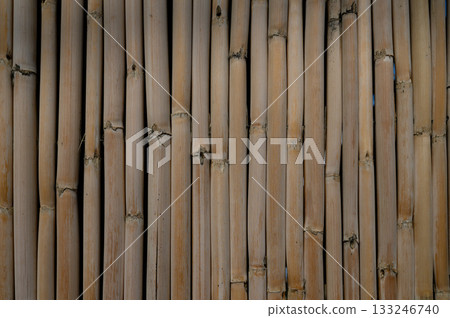 Bamboo wall texture creates a serene backdrop for a peaceful retreat setting 133246740