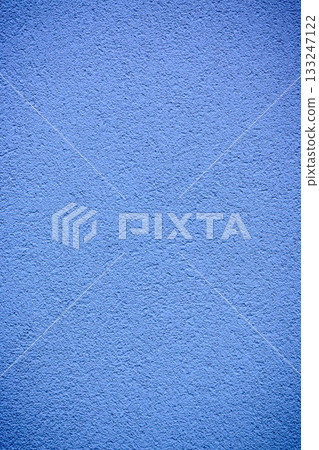Vibrant blue wall texture inviting creativity under bright daylight Vibrant blue wall texture inviting creativity under bright daylight 133247122