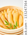 A traditional Japanese dish of unbleached and unprocessed herring roe served in a wooden barrel (white background) 133247364