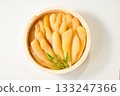A traditional Japanese dish of unbleached and unprocessed herring roe served in a wooden barrel (white background) 133247366