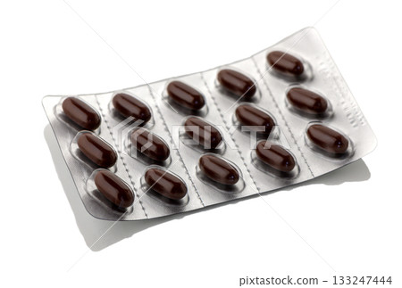 Vitamin Capsule Bottle and Blister Pack on White Background Vitamin Capsule Bottle and Blister Pack on White Background 133247444