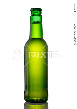 Green beer bottle without label isolated on white background Green beer bottle without label isolated on white background 133247454