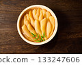 A traditional Japanese dish of unbleached and unprocessed herring roe served in a wooden barrel (wood grain background) 133247606