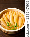 A traditional Japanese dish of unbleached and unprocessed herring roe served in a wooden barrel (wood grain background) 133247609