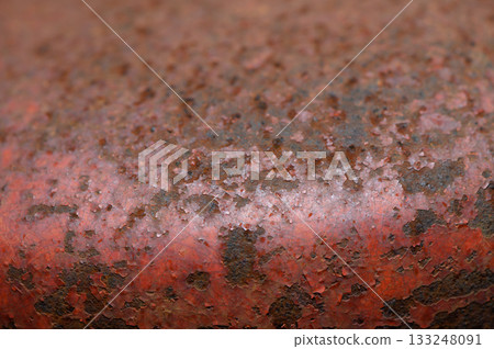 Rusty surface reveals stories of time and elements in an abandoned industrial setting Rusty surface reveals stories of time and elements in an abandoned industrial setting 133248091