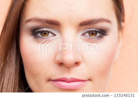 Close up of woman face with make up. 133248131