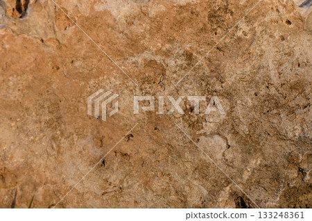 Exploration of ancient textures and patterns on weathered stone surfaces in nature Exploration of ancient textures and patterns on weathered stone surfaces in nature 133248361
