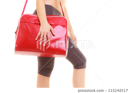 Sport. Red gym bag of fitness sporty girl in sportswear Sport. Red gym bag of fitness sporty girl in sportswear 133248517