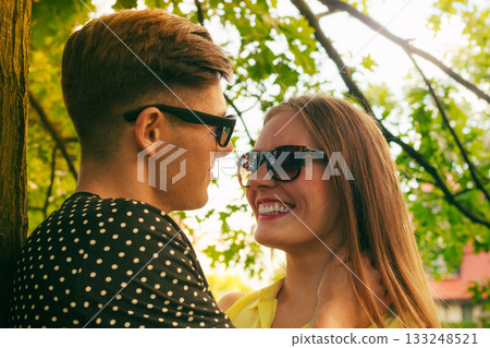 Smiling couple in park Smiling couple in park 133248521