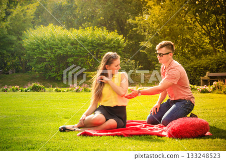 Couple with big heart on picnic 133248523