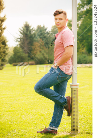 Handsome boy in park Handsome boy in park 133248524