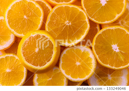 Vibrant citrus slices create a sunny and refreshing display, perfect for summer gatherings Vibrant citrus slices create a sunny and refreshing display, perfect for summer gatherings 133249046