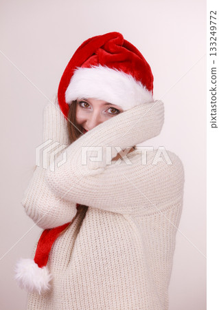 Beautiful girl wearing christmas cap. Beautiful girl wearing christmas cap. 133249772