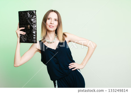 stylish woman fashion girl holding black handbag stylish woman fashion girl holding black handbag 133249814