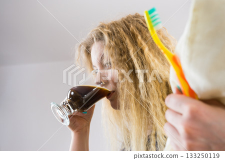 Funny woman being late drinking coffee 133250119