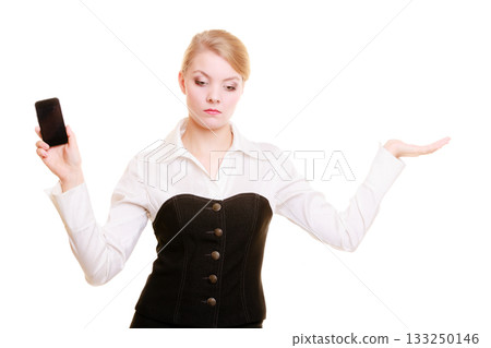 Ad. Businesswoman with phone showing copy space Ad. Businesswoman with phone showing copy space 133250146
