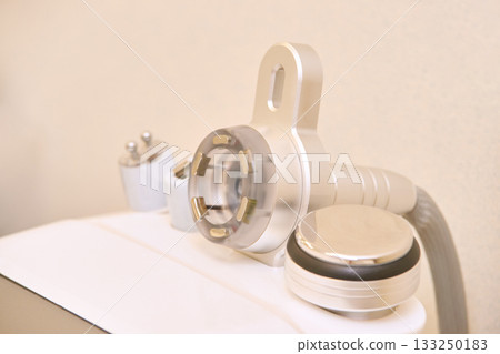 Advanced beauty device with multiple attachments for skincare treatments in spa 133250183