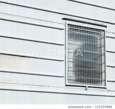 Windows behind bars in a special carriage for transporting prisoners, industry. Copy space for text Windows behind bars in a special carriage for transporting prisoners, industry. Copy space for text 133250966