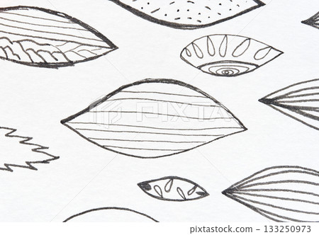 Hand-drawn leaf patterns on white background with various shapes and textures 133250973