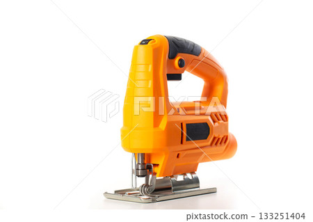 A modern, new electric hand-held jigsaw on a white background, isolated. Power tool for woodworking, close-up A modern, new electric hand-held jigsaw on a white background, isolated. Power tool for woodworking, close-up 133251404
