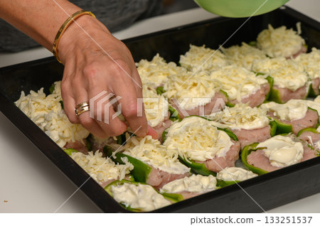 Delicious preparation of a savory dish with colorful ingredients at home kitchen 133251537