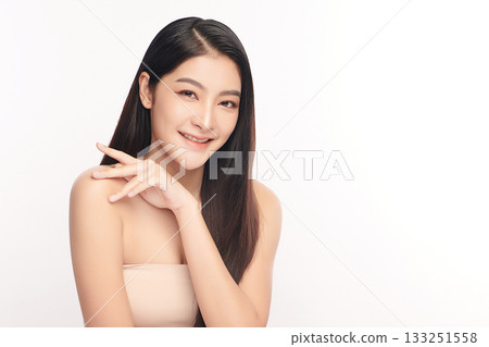 A beautiful young Asian woman with clean, fresh skin against a white background. Skincare, facial treatment, cosmetology, beauty, and spa. An elegant portrait of an Asian woman. A beautiful young Asian woman with clean, fresh skin against a white background. Skincare, facial treatment, cosmetology, beauty, and spa. An elegant portrait of an Asian woman. 133251558