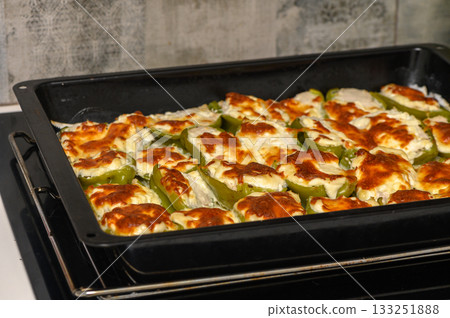 Delicious stuffed bell peppers baked to perfection, a vibrant dish ready to savor and enjoy at any meal 133251888