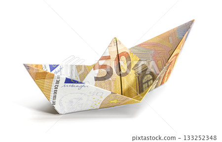 Euro fifty banknote folded into paper boat origami Euro fifty banknote folded into paper boat origami 133252348