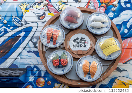 Kura sushi restaurant sign featuring delicious nigiri 133252483