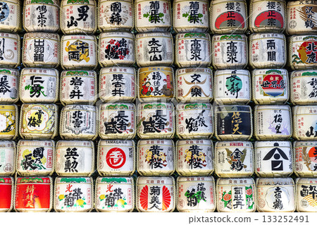 Traditional sake barrels decorating japanese shinto shrine wall 133252491