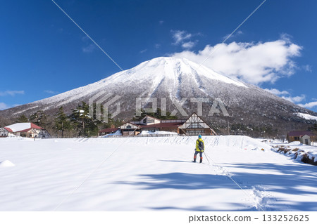 Snowshoe trekking image with Mt. Oyama in the background Snowshoe trekking image with Mt. Oyama in the background 133252625