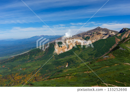 The magnificent mountain scenery of Mt. Tokachi seen from the Furanodake hiking trail (Hokkaido) The magnificent mountain scenery of Mt. Tokachi seen from the Furanodake hiking trail (Hokkaido) 133252698