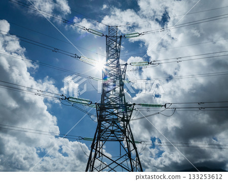 Aerial view of high voltage electric tower in city Aerial view of high voltage electric tower in city 133253612