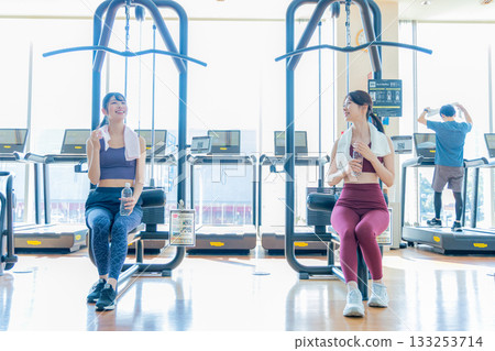 Friends taking a break at the gym 133253714