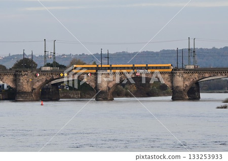 Pearl of the Elbe River: A tram crossing the Augustus Bridge in Dresden's Old Town, Germany Pearl of the Elbe River: A tram crossing the Augustus Bridge in Dresden's Old Town, Germany 133253933